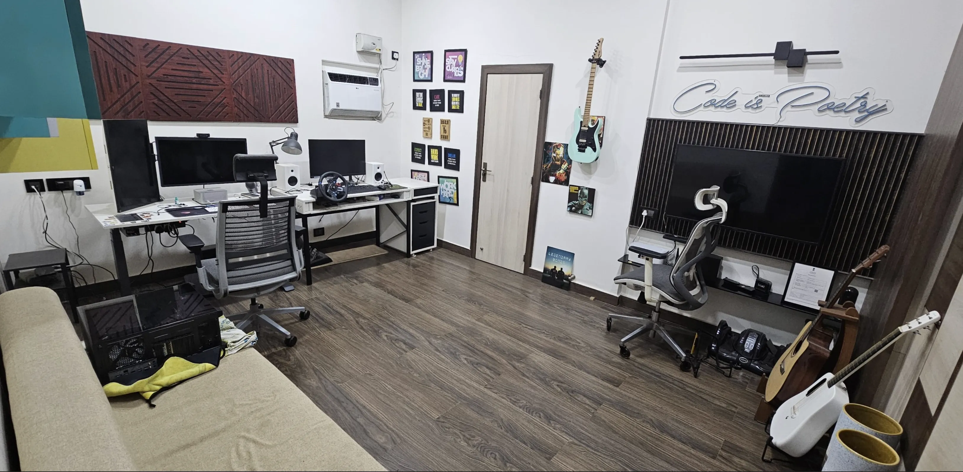 My full studio with the main workstation, gaming setup, chairs, TV, and guitars